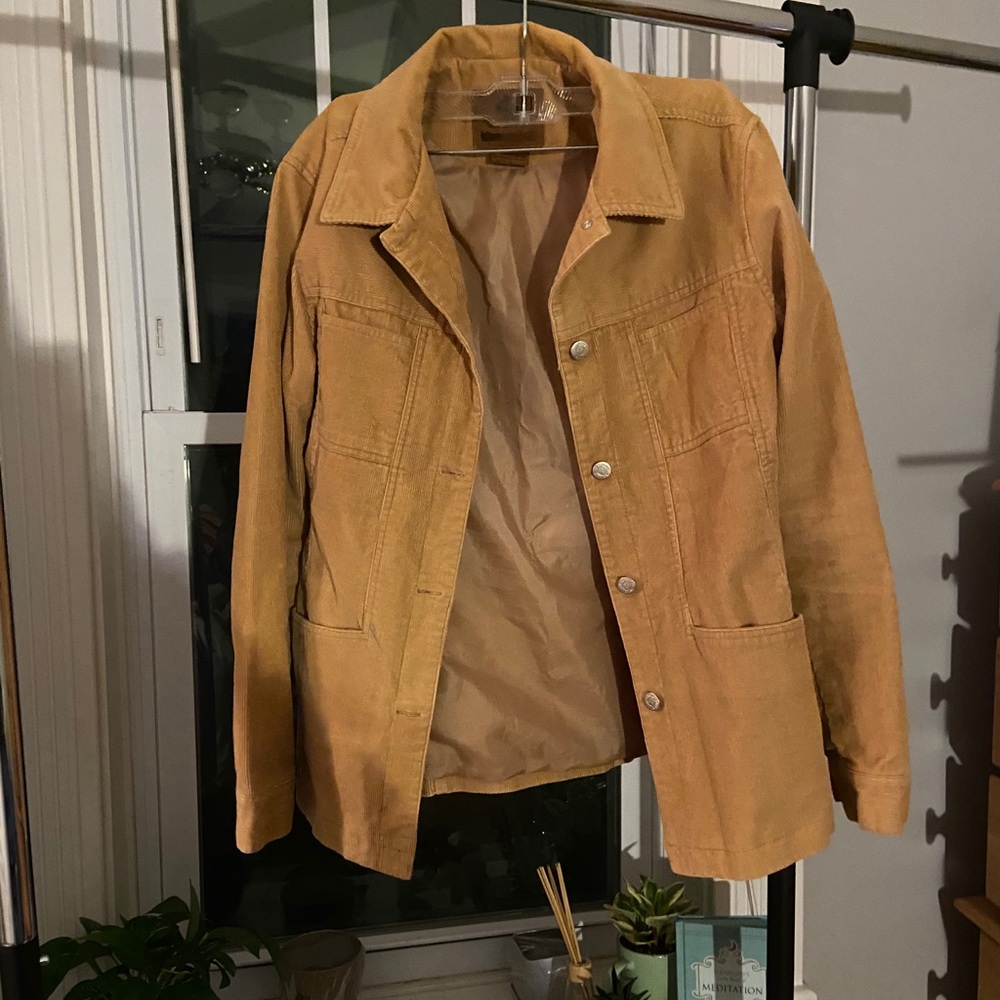 Tan corduroy jacket.